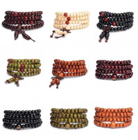 Stylish designer bracelet made of wooden beads - Buddhist sandalwood beads, meditation rosary, yoga bracelet