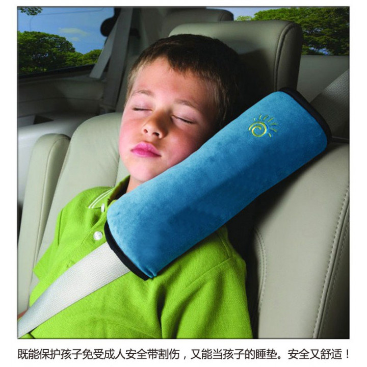 Child seat belt outlet shoulder pad