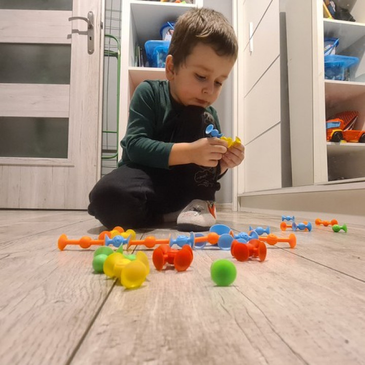 Childrens building set for fine motor skills, creativity, coordination, with Velcro suction cups - Happy Suckers