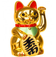 Oriental symbol, a golden cat Maneki Neko, waving its paw, lures good luck, prosperity, happiness