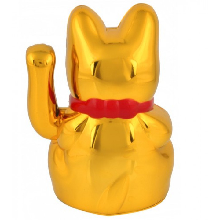 Austrumu simbols, milzīgs zelta kaķis Maneki Neko, vicinot ķepu, vilina veiksmi, labklājību, laimi
