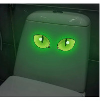 Sticker joke, green cat eyes for unexpected places, toilet lid, door, car