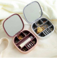 Compact organizer box with a mirror and 7 compartments for storing and transporting jewelry