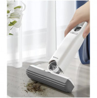 Compact, self-wringing mini brush for quick cleaning of surfaces, floors, windowsills, countertops