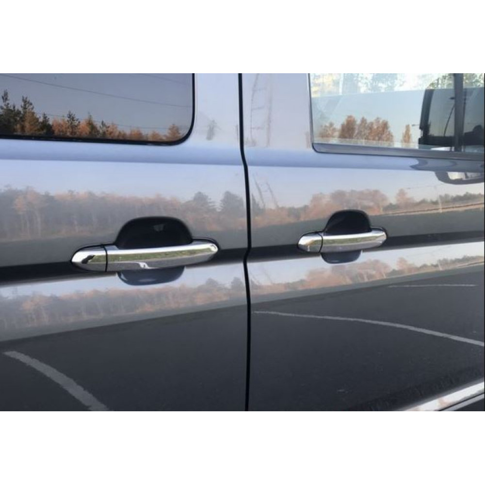 A set of chrome moldings with overlays on the door handles for Volkswagen Crafter
