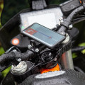 Durable, ergonomic phone and navigator holder for motorcycles and scooters with vibration suppression function