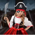 Accessories for a real pirate costume - a telescope, a compass, an eye patch