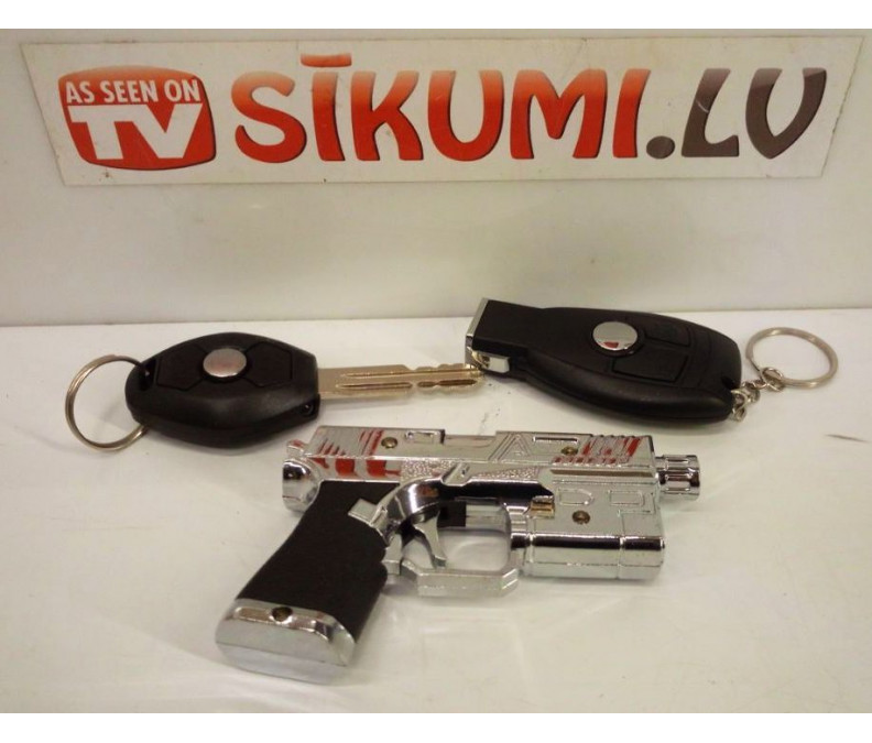 Pocket stun gun, keychain for pranks, in the form of car keys or a pistol, shocks the owner at the touch of a button