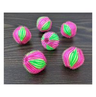 Reusable balls for collecting lint, debris, hair when washing clothes