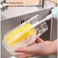 Electric brush with replaceable attachments for easy and convenient washing of glasses, thermoses, thermoses, baby bottles