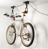 Mounting a bicycle under the ceiling with a lifting mechanism for storage in a garage, apartment, country house, at home